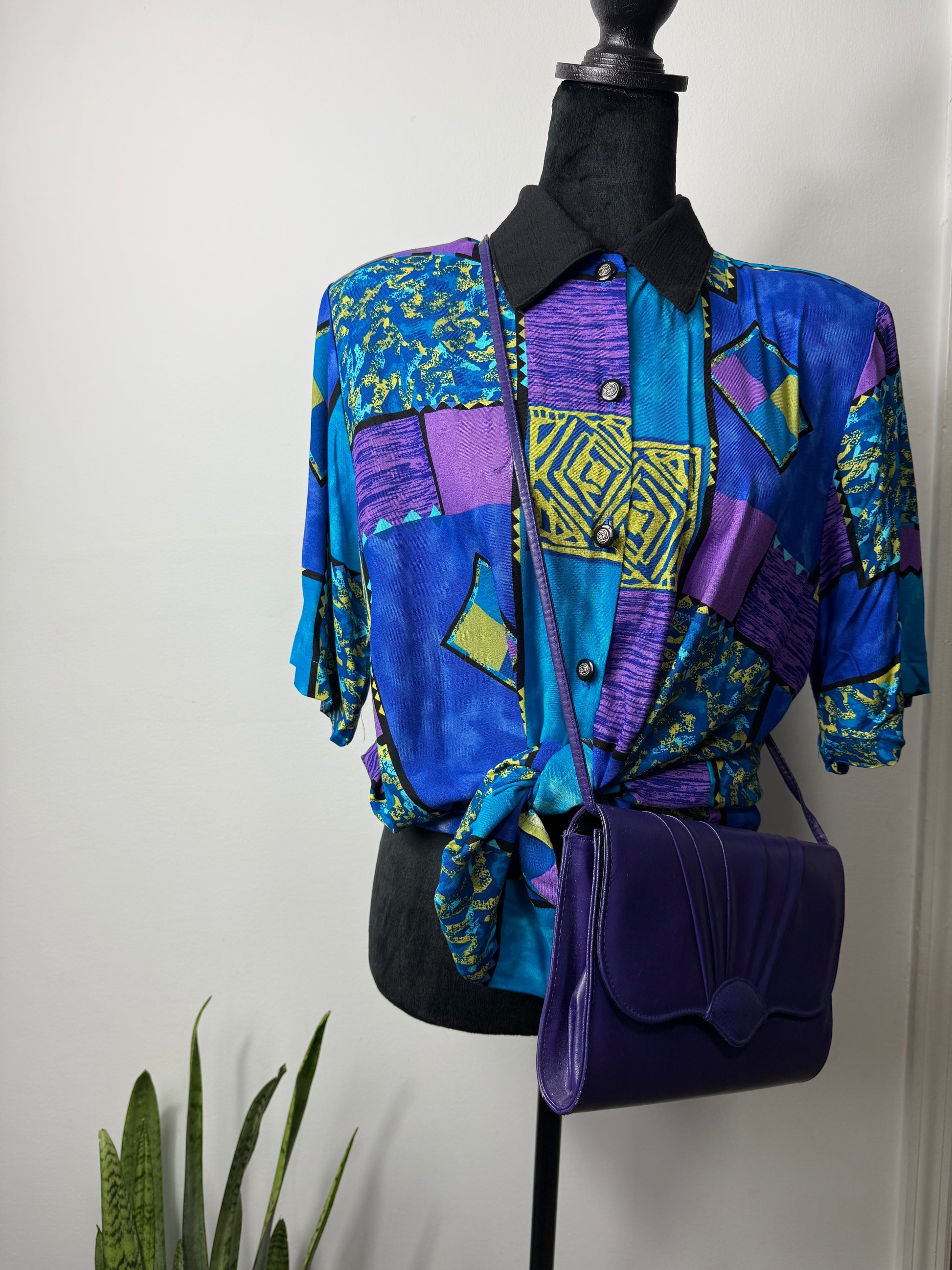 From the black mixed print vintage top